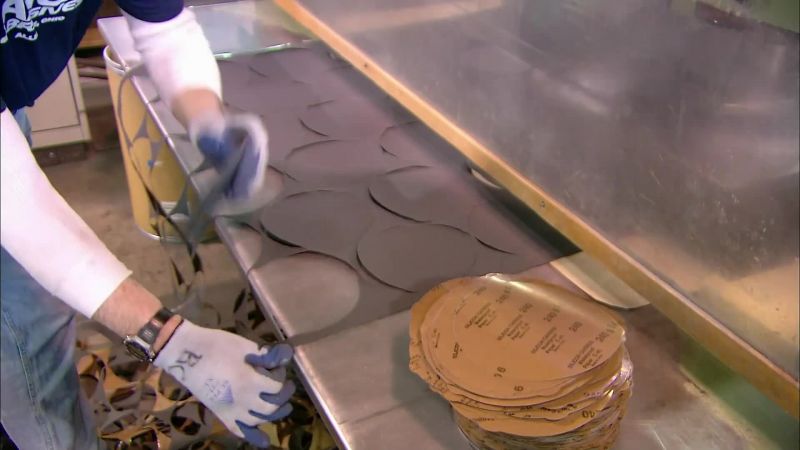 ANOTHER MACHINE PUNCHES OUT SANDING DISCS