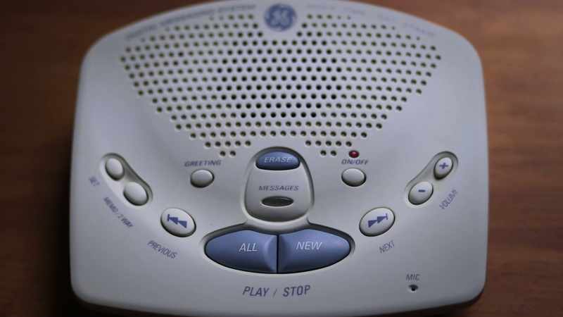 [answering machine beeps]