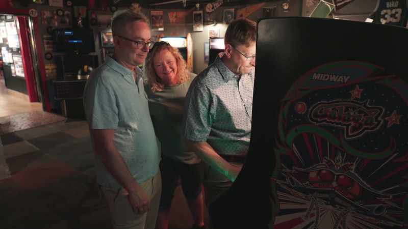 [arcade game beeping]