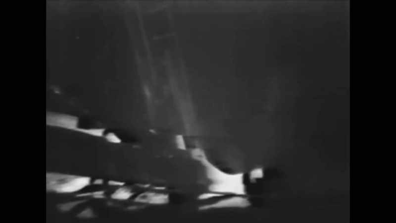 Armstrong clutches the camera to his chest