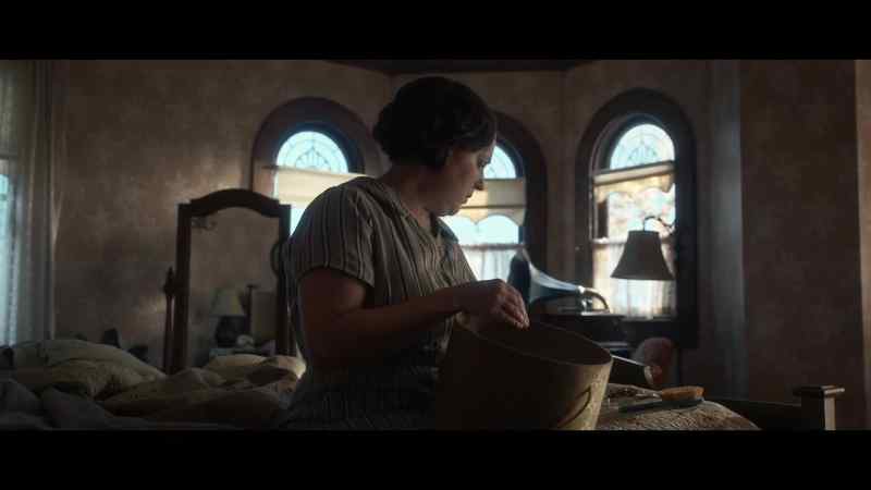 As Alma studied the various items