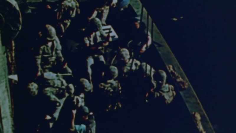 As daylight breaks, the ships open fire above their heads