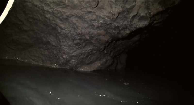 As I surfaced, the filth floating on the water