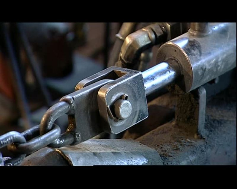 AS THE CLAMP HOLDS THE FLIGHTING IN POSITION