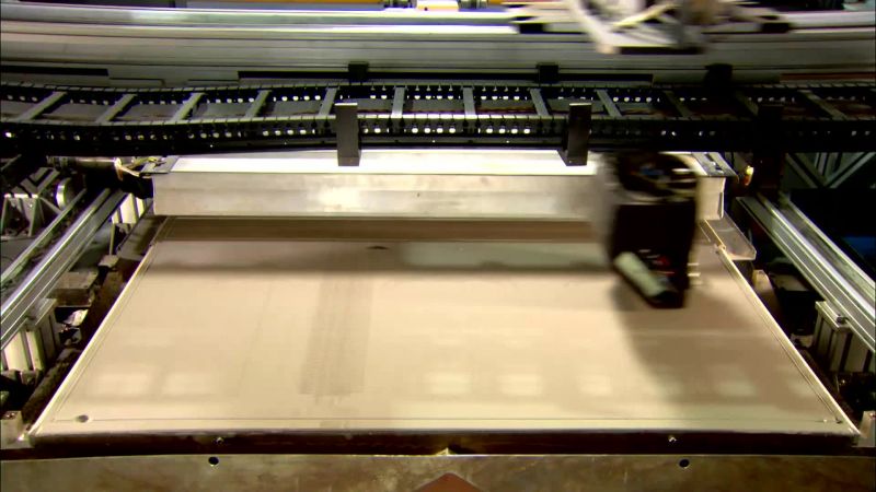 AS THE PRINTHEAD MOVES BACK AND FORTH