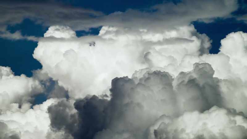 As the vapour rises, it condenses into clouds