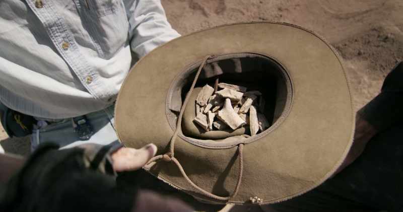 As these piles that we've swept up go through the sieve