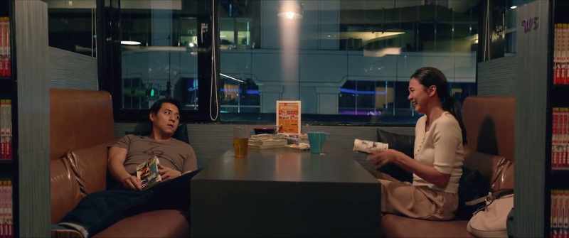 At first, the two sat back to back