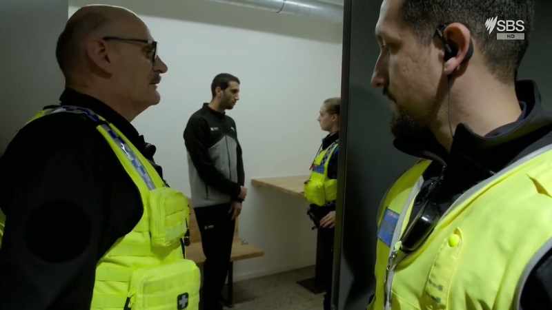 At the police post, Virginia is processing the Moroccan man