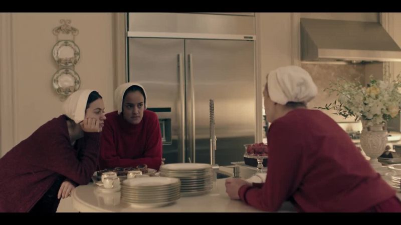 [Aunt Lydia chuckles]