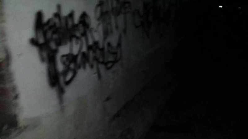 Back here in the alley where she was arrested