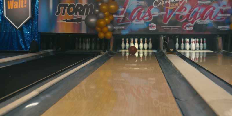 (ball thudding) - (bowling pins clattering)