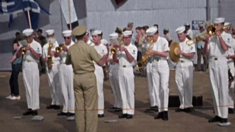 [BAND PLAYING]