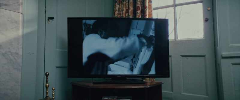 (BANGING ON TV) -(BANGING NOISE IN DISTANCE)