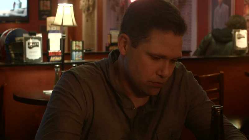 (bar patrons chattering) (low country music)