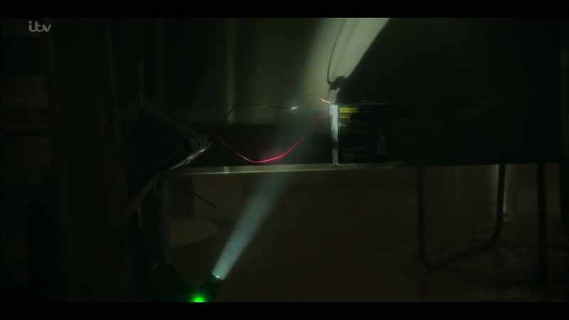 Battery pack explosive taped underneath the desk