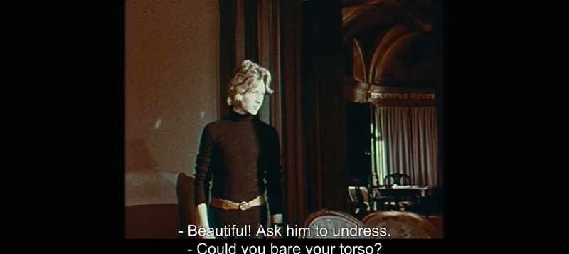 Beautiful! Ask him to undress. - Could you bare your torso?
