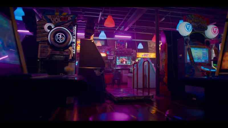 [beeping and gunfire in arcade games]