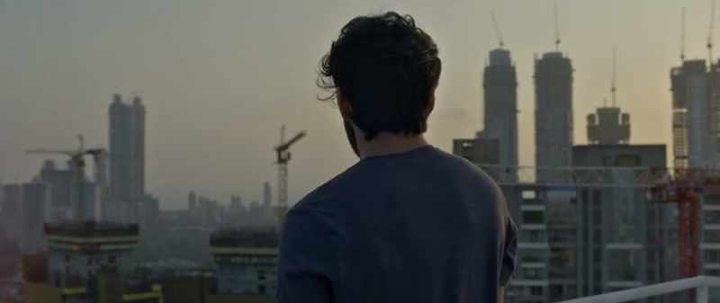 'Before the setting sun, his dark silhouette stood'