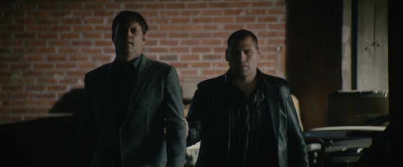 Being interrogated by a cartel leader