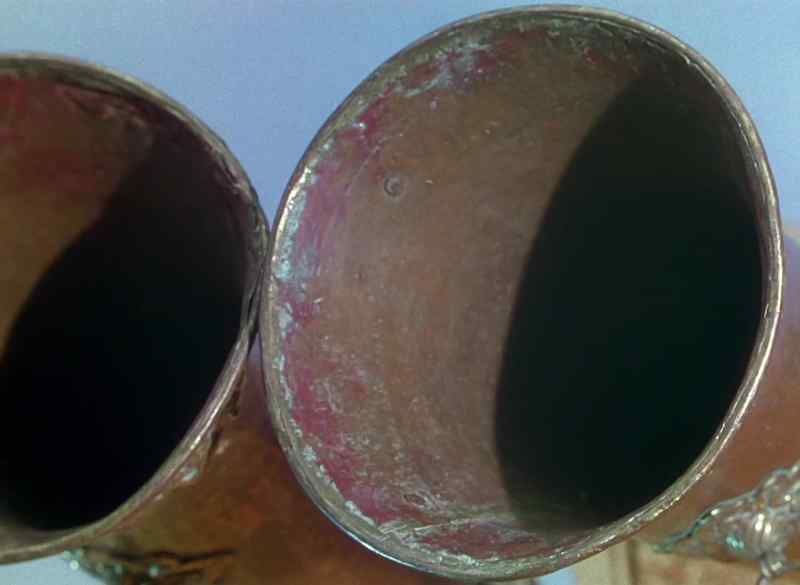 (Bell and prolonged note of horn echo)
