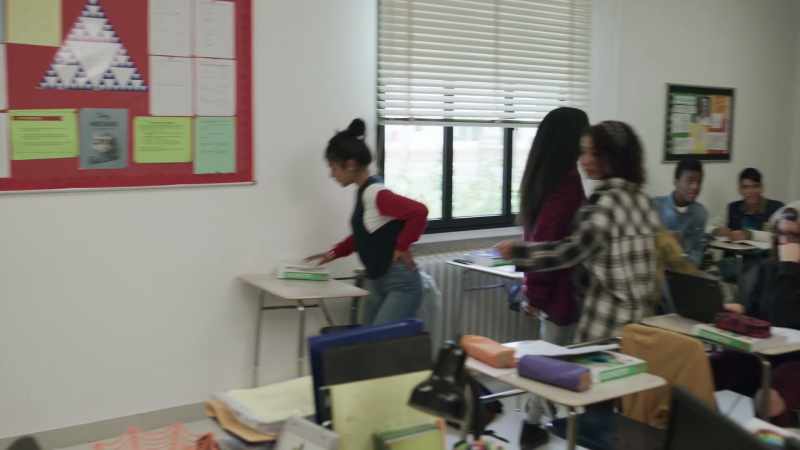 (bell rings, student chatter)