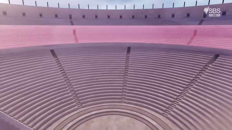 Below them, the orchestra