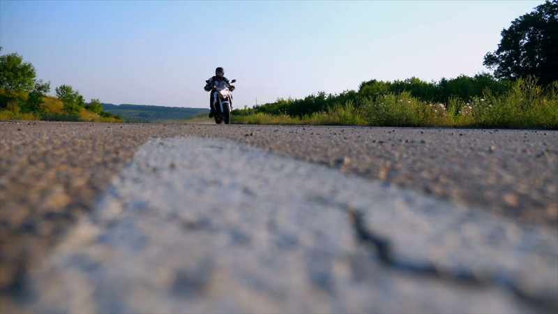 (bike roaring)