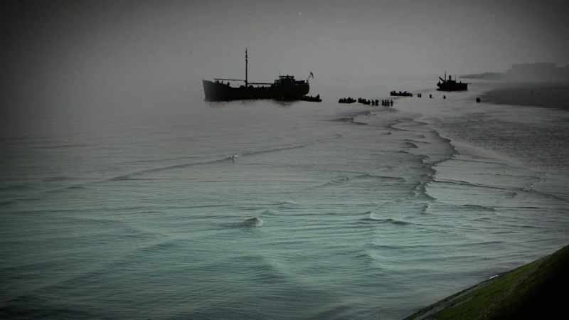 Boat crews haul the exhausted men on board
