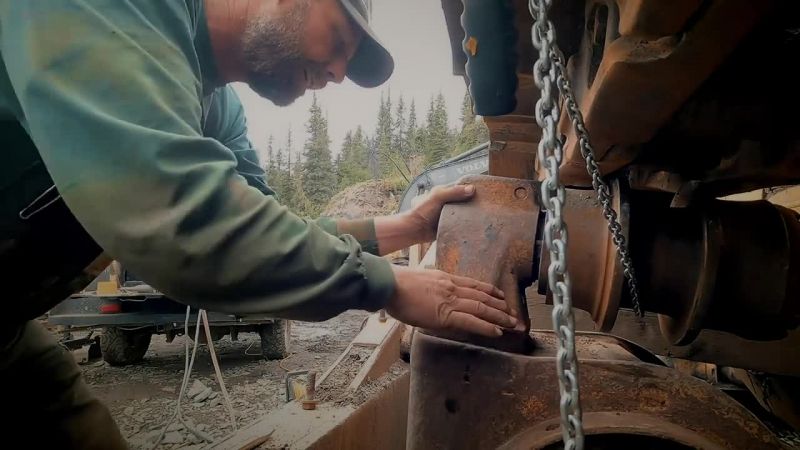 Bolt down the pedestal with the one remaining bolt