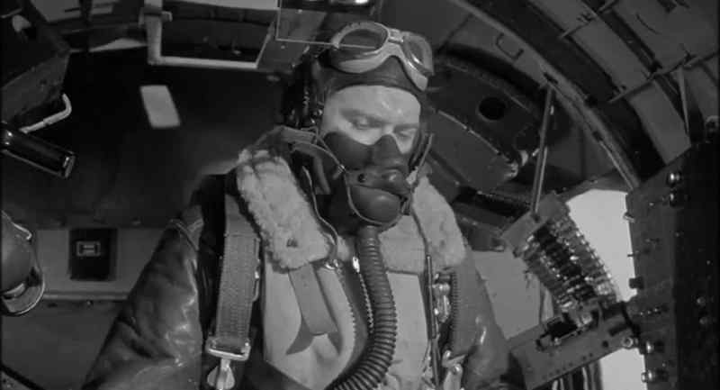 Bomb bay doors are jammed open. One bomb is still hung up