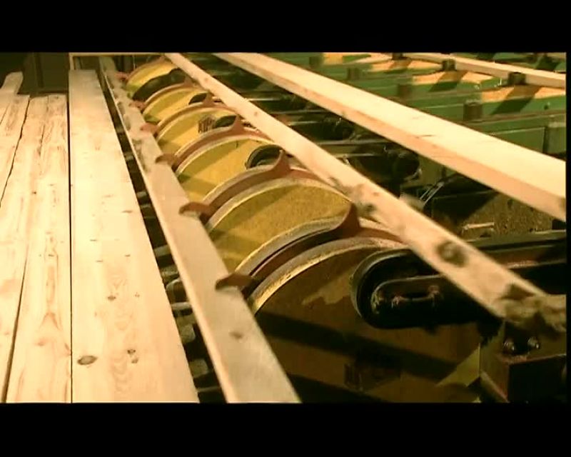 BOTH PRODUCTION LINES FEED TO MACHINES THAT SMOOTH THE EDGES