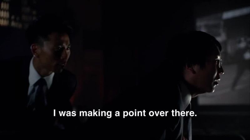 (BOTH WHISPERING IN JAPANESE)