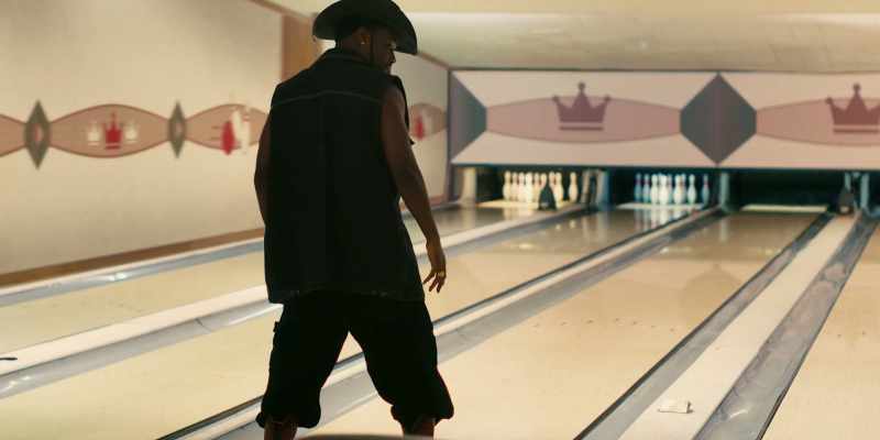 (bowling pins clattering)
