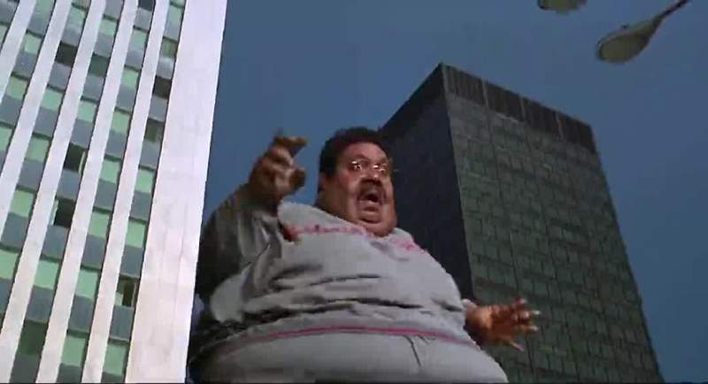 Boy he looks like King Kong with titties