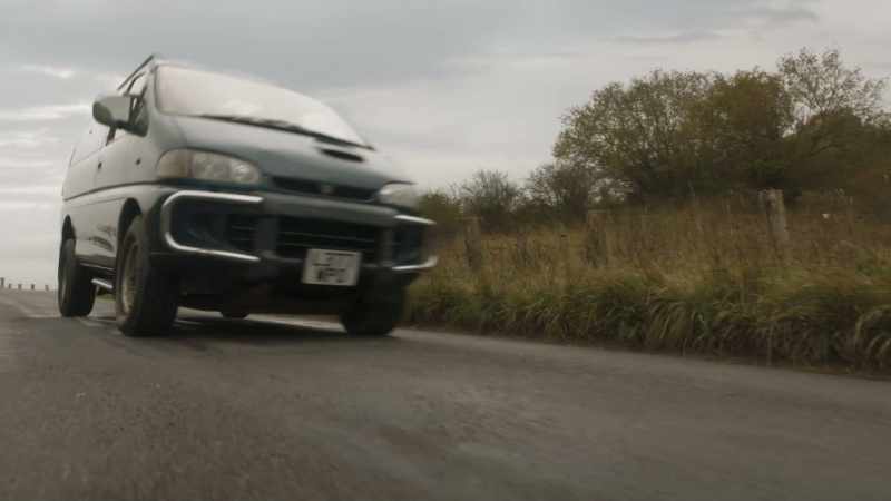 (BRAKES SCREECHING)