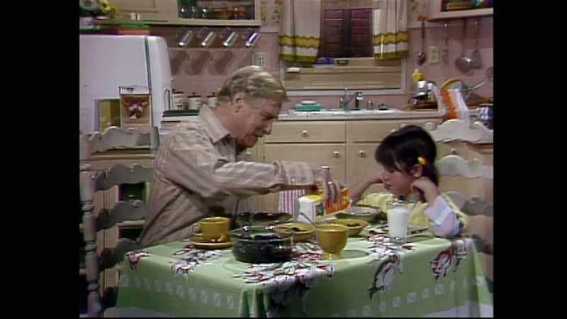 Bran cereal, milk, and stewed prunes