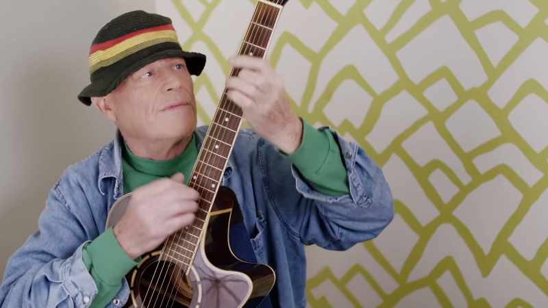 (bright guitar music)