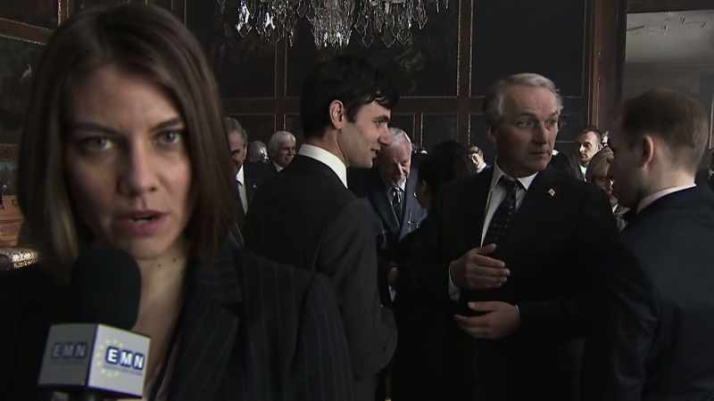 [ British accent ] I'm here at the Global Economic Summit
