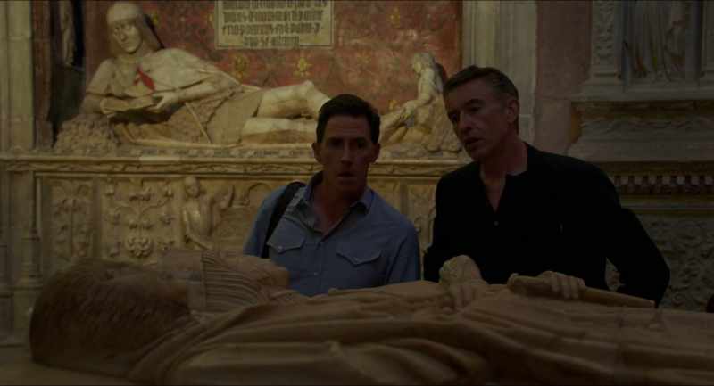 Buried, lying next to each other for eternity