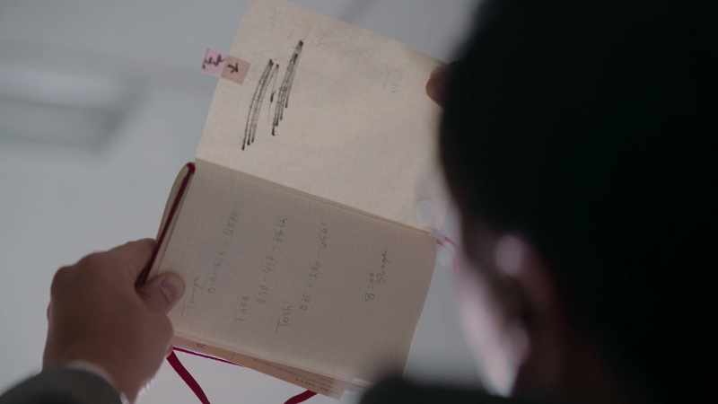 But when we held it up to the light we could identify the digits