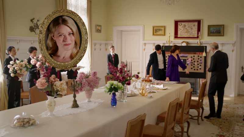 But why are they seated at a table with the Americans?
