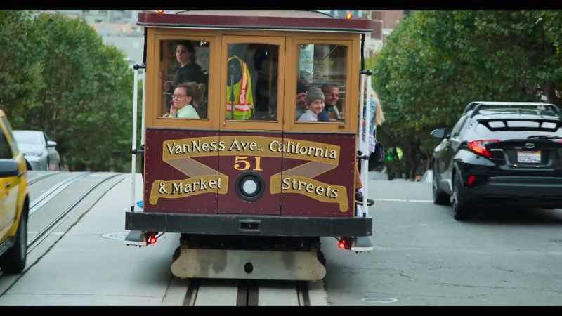[cable car bell rings]