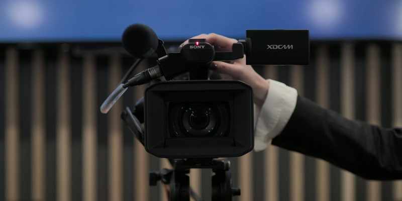 (CAMERA BEEPS)