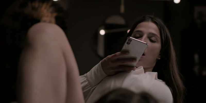 (CAMERA SHUTTER CLICKS) -(PHONE BUZZES)