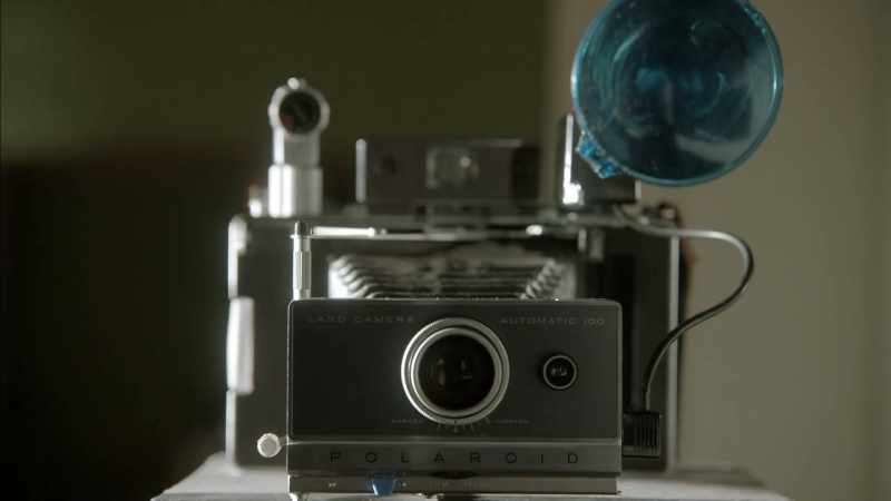 [ CAMERA WHIRS ]