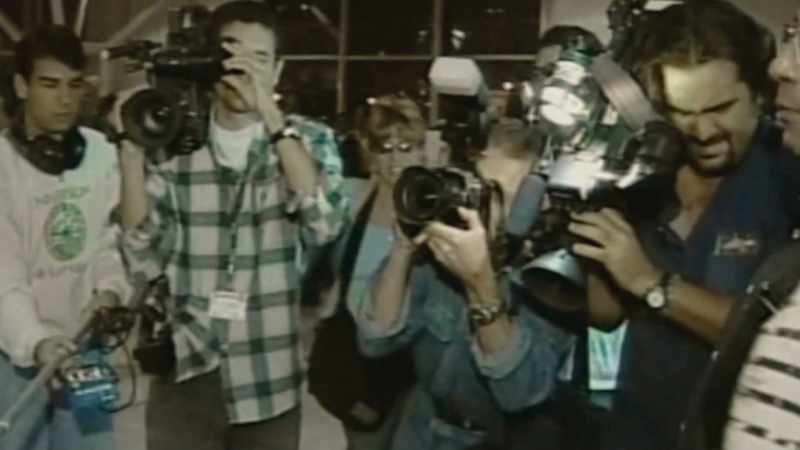 (cameras clicking)