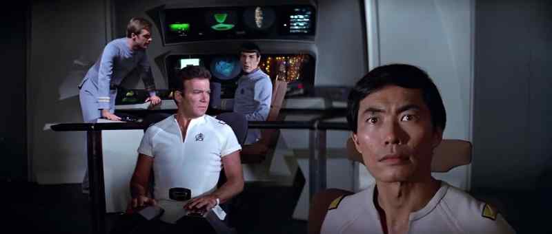 Captain, we've been seized by a tractor beam