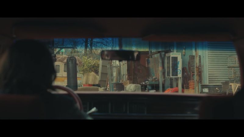 [car doors open] - [♪ muffled rap music playing]