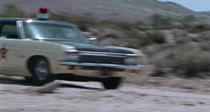 (car engine humming)